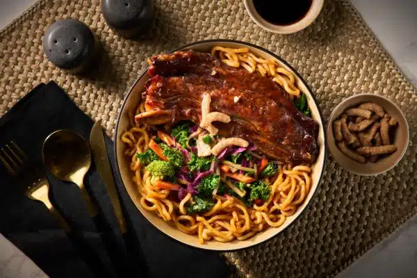 Make these grilled Korean beef short ribs the next time you are craving something bursting with sweet and savory flavor! Ribs cut Flanken style take less than 10 minutes to grill. Serve on top of the Korean Sesame Hot or Cold Salad and Noodle Meal Kit for a restaurant quality meal. Delicious!